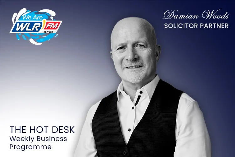 Damian Woods, Solicitor Partner, in a black and white portrait beside the WLR FM logo and the words The Hot Desk