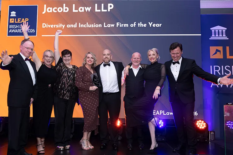 Jacob Law LLP team on stage at the Irish Law Awards 2026 under a screen reading Diversity and Inclusion Law Firm of the Year