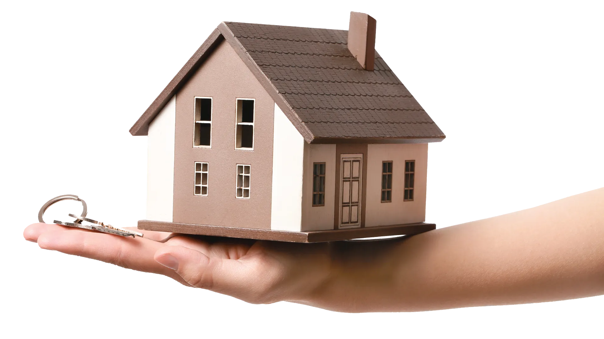 A model house and a set of keys resting on an open hand