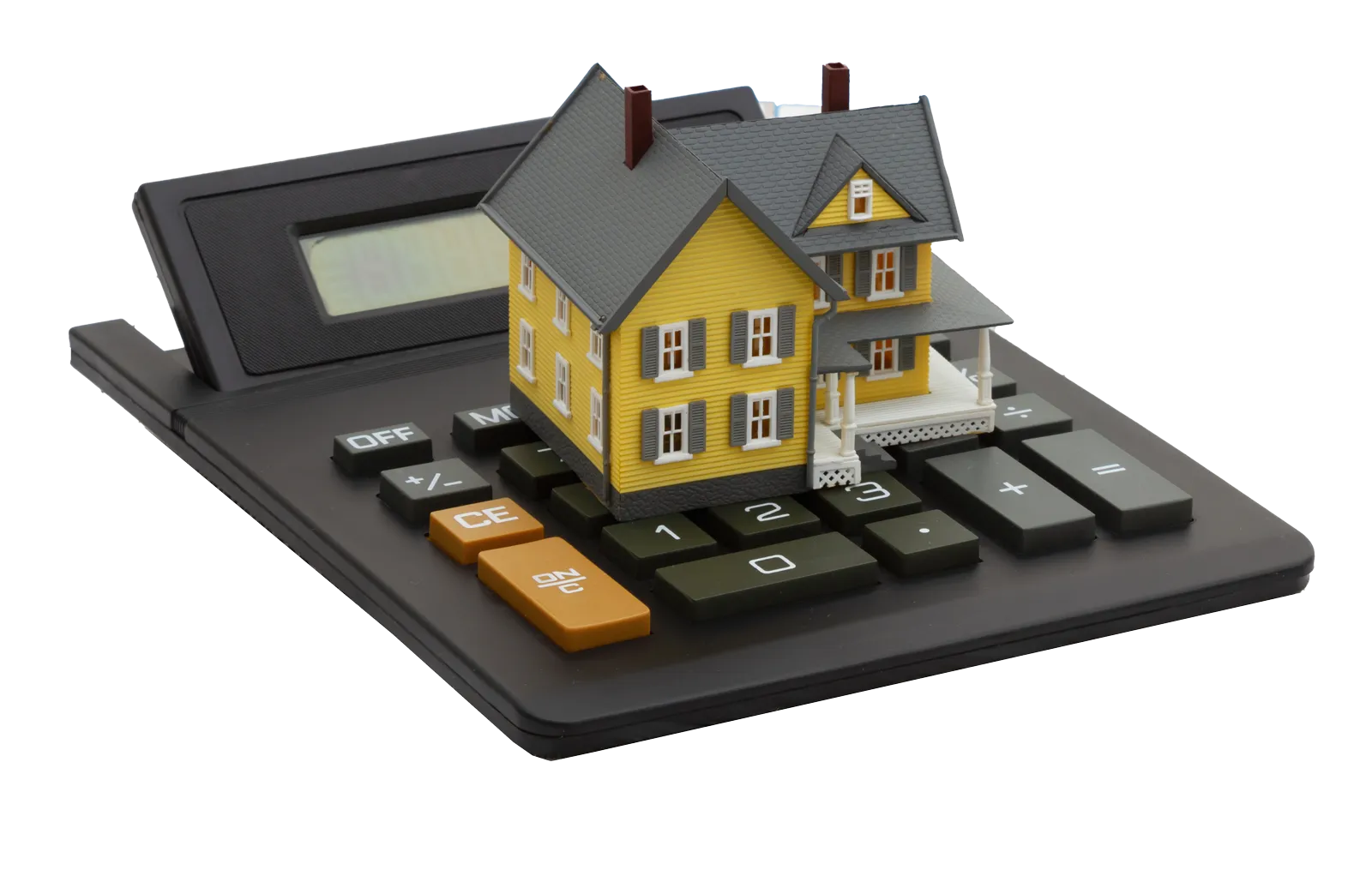 A model house standing on a calculator